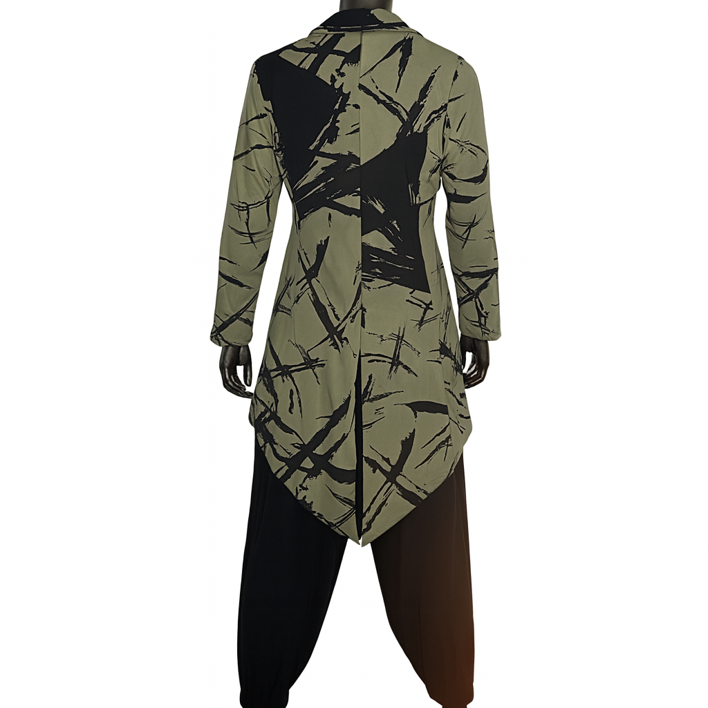 Green and black patterned dress on a mannequin against a white background