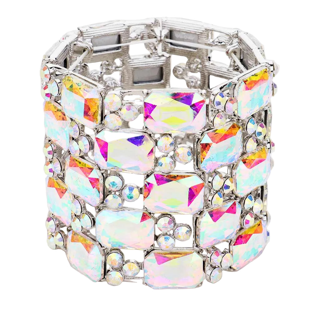 Decorative container with colorful gemstones on a white background