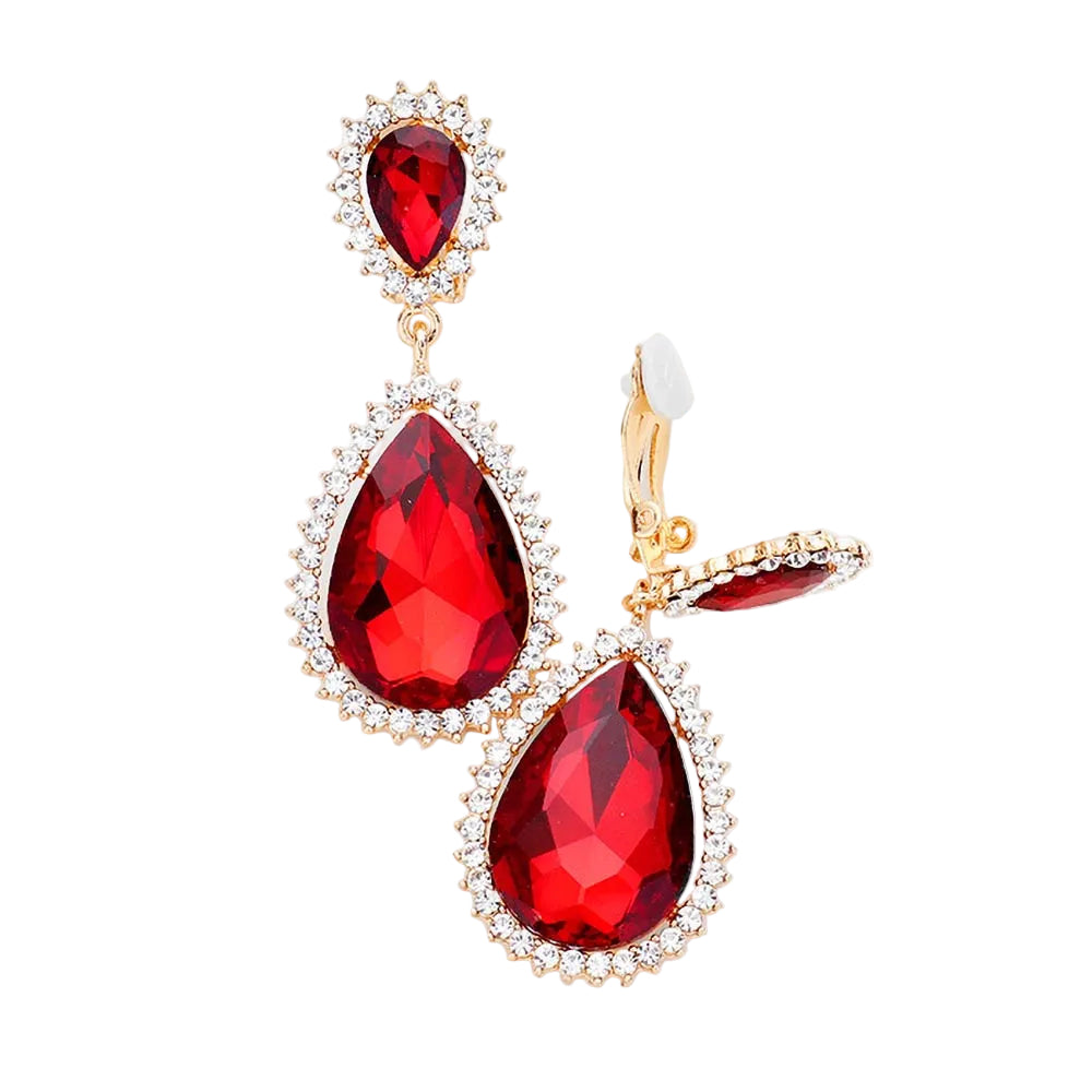 Red teardrop earrings with gold accents on a light gray background