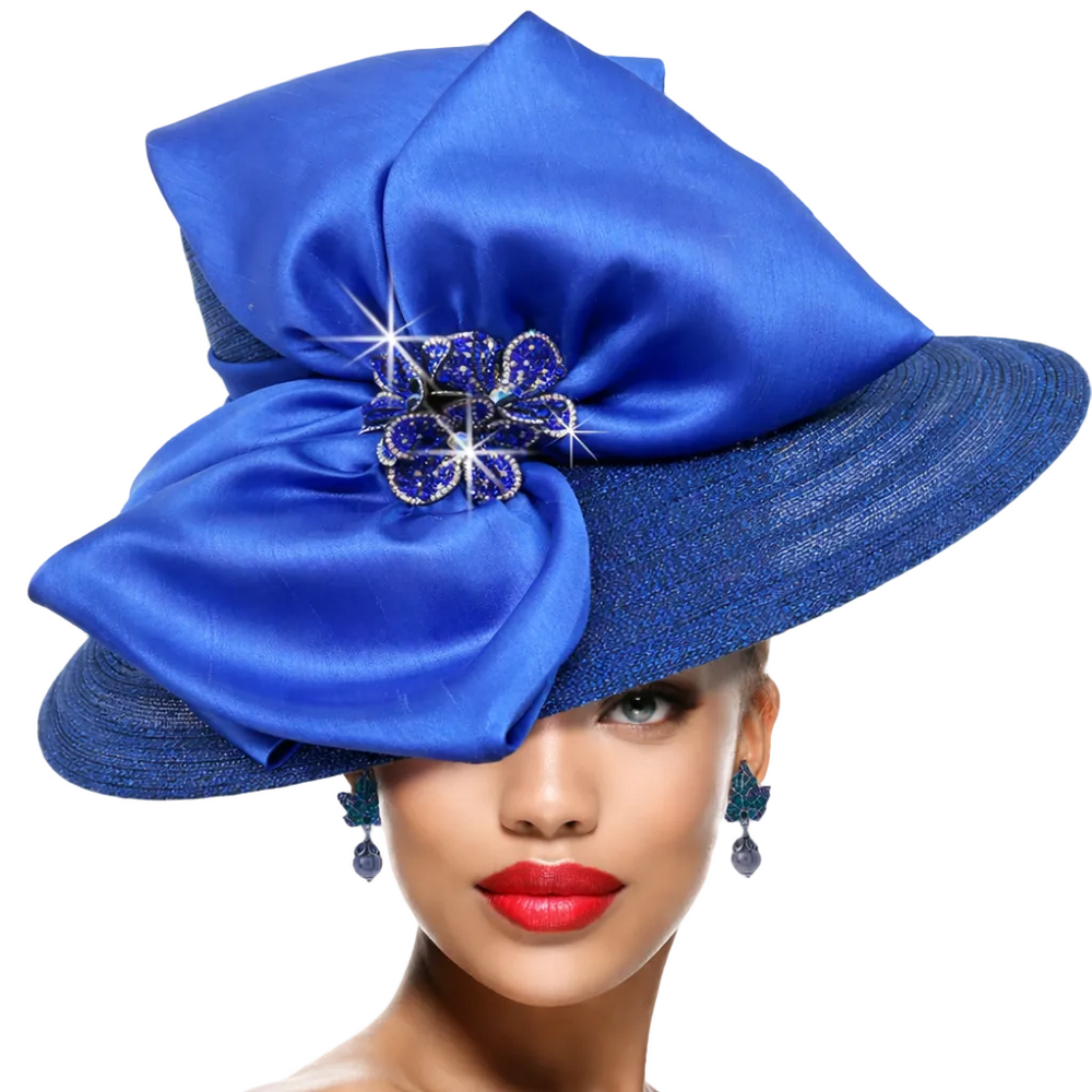 Blue decorative hat with a brooch worn by a model on a gray background