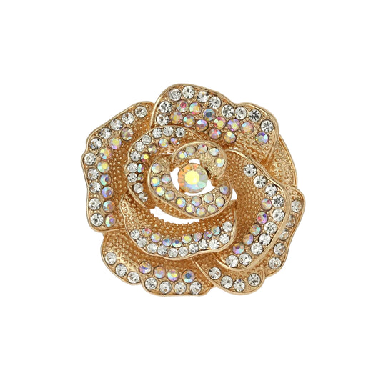 A gold-tone rose-shaped brooch or pin embellished with clear and iridescent rhinestones, shown on a plain white background with a small inset of the pin backing at the top right.