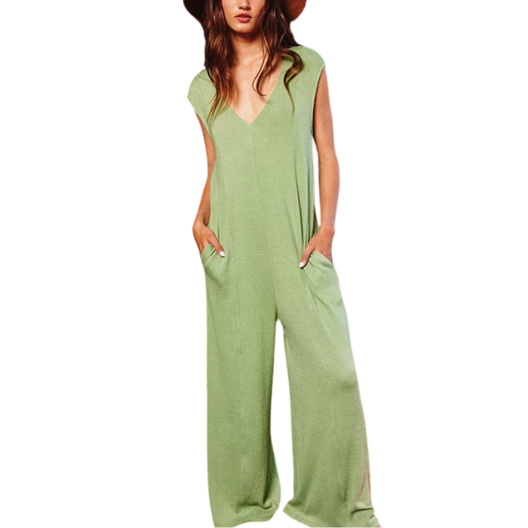Woman wearing a green jumpsuit on a white background