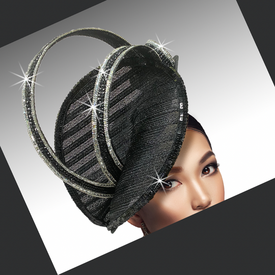 Black decorative headpiece with rhinestones on a model against a white background