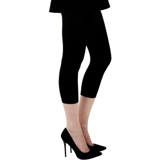 Black capri pants worn by a person on a white background