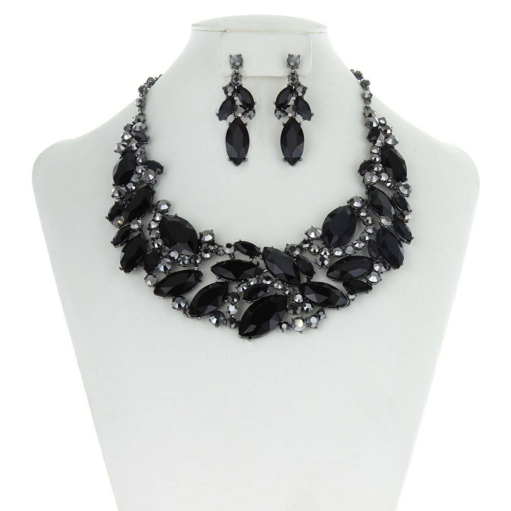 A black marquise rhinestone leaf cluster necklace and earring set displayed on a white mannequin.