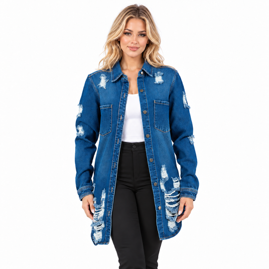 A woman modeling a distressed blue denim button-up shirt jacket over a white top and black pants, photographed against a plain white studio background.