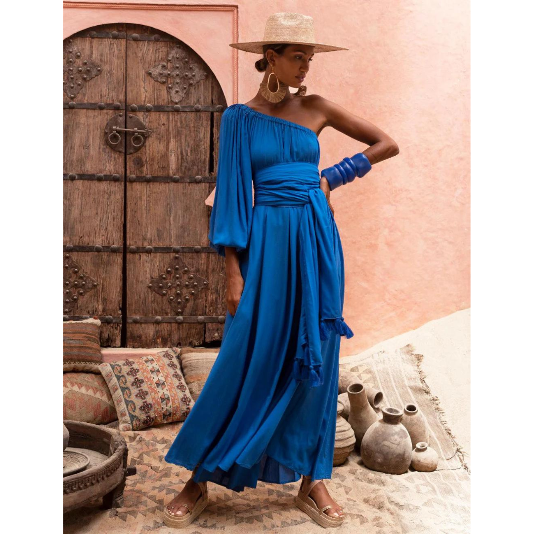 erika pena blue dress Strut into spring in our Joelle Maxi! Magenta & blue stripes + that signature bow moment = main character energy Ready to turn heads at every occasion! #MaxiDressStyle #SpringFashion2024 #ResortWear #LuxuryFashion #DressGoals #ErikaPena