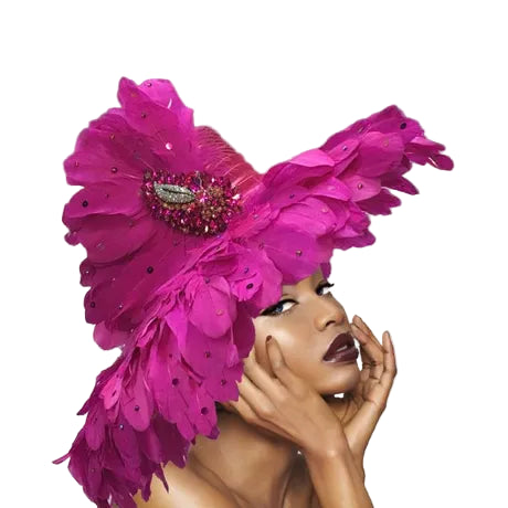 Woman wearing a vibrant pink feathered headpiece with gemstones on a gradient background