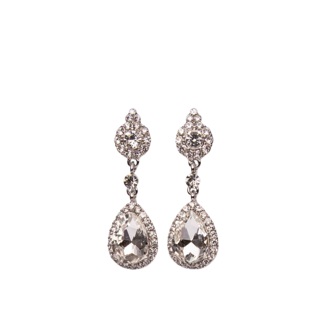 Pair of silver teardrop earrings with clear gemstones on a white background
