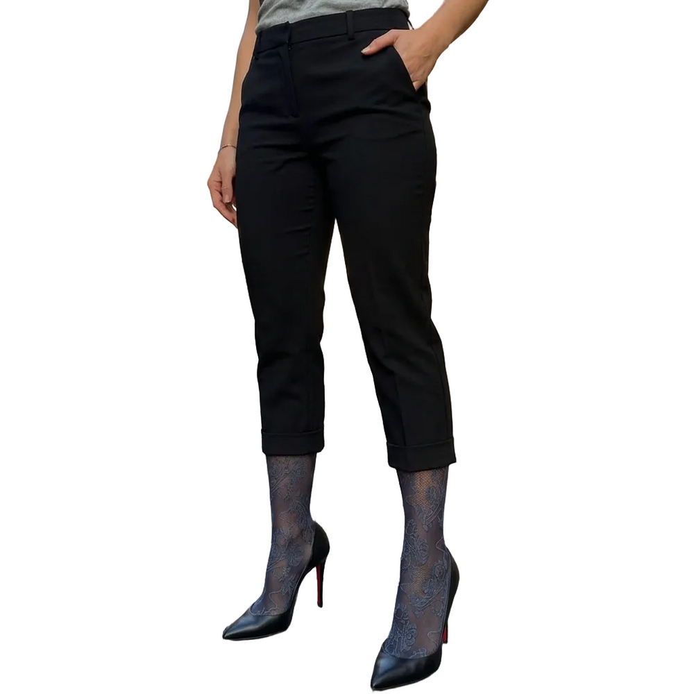 Floral lace sheer tights with cross-hatched pattern worn with heels