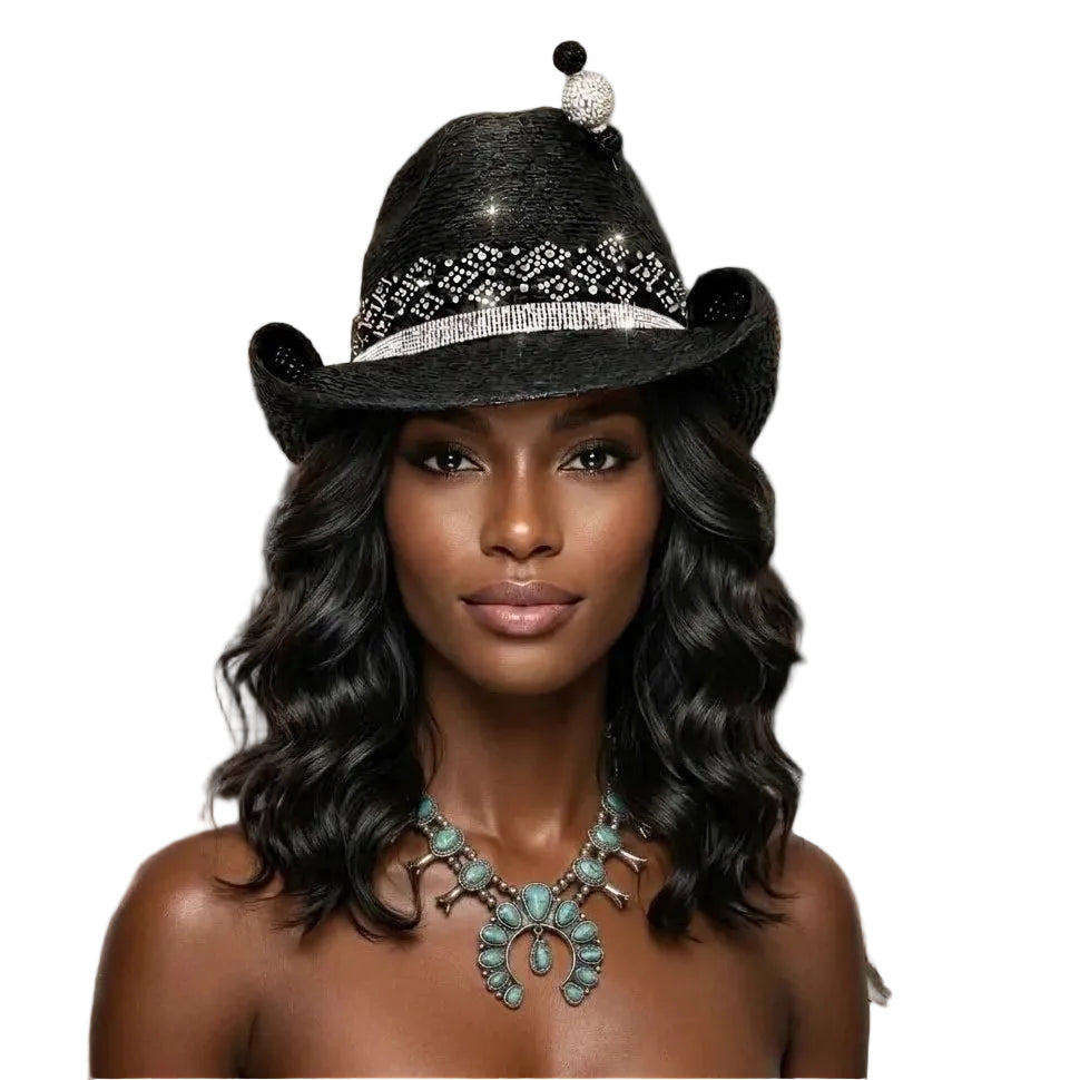 Woman wearing a decorative black hat in a rustic store setting with shelves of boots and decor.