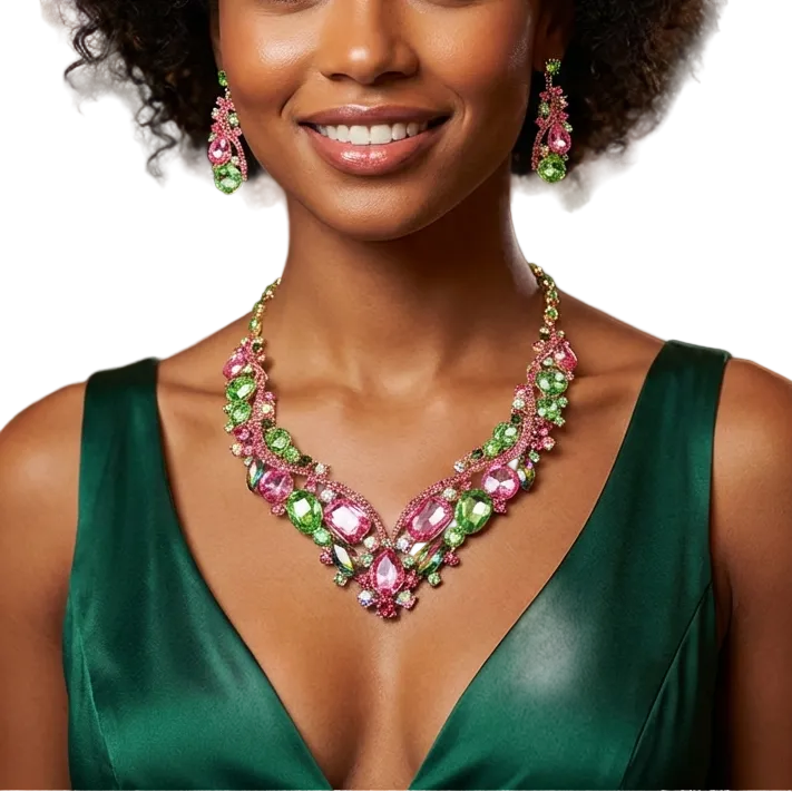 Woman wearing a green dress and pink and green jewelry in a formal setting