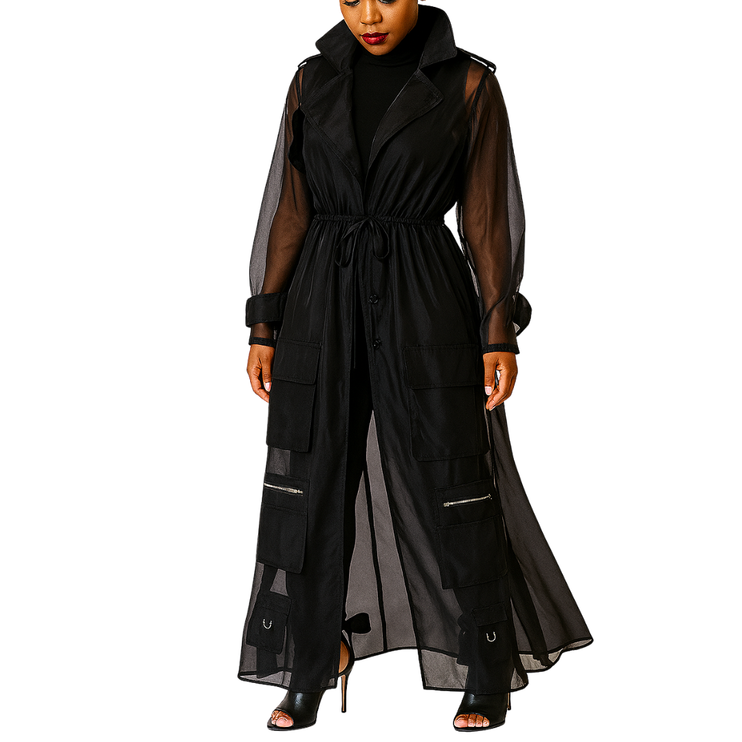 Black long dress with sheer sleeves and panels on a white background