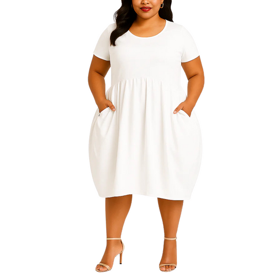 Woman wearing a white dress on a white background