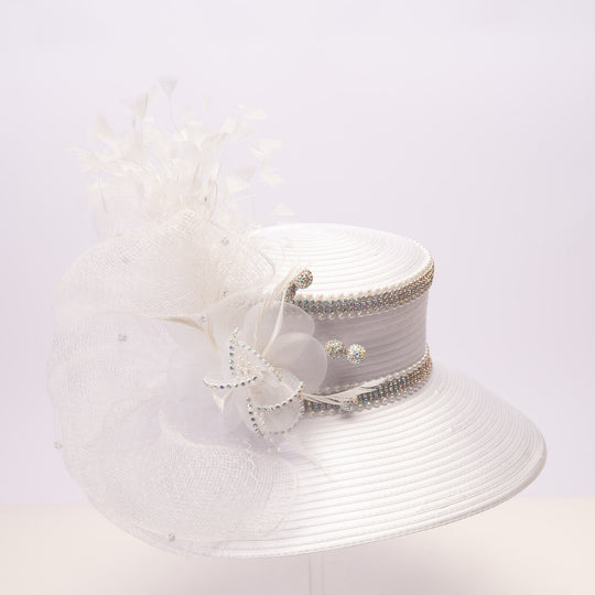 White satin sailor hat with large mesh crinoline bow, crystal accents, rhinestone band, and wide brim