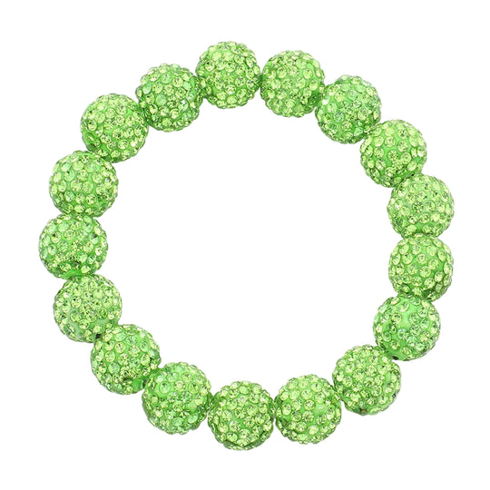 Green beaded bracelet on a white background