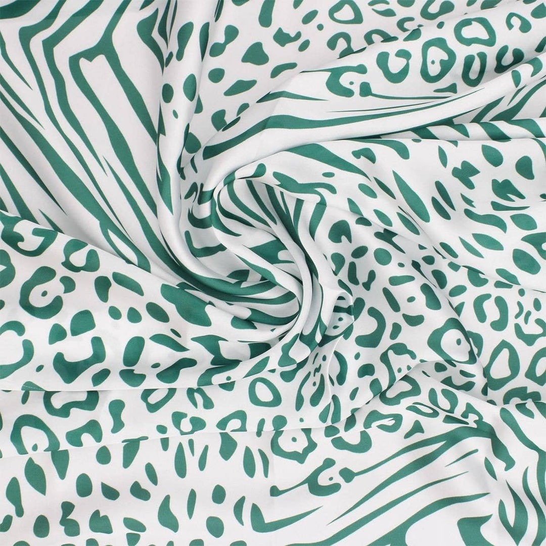 AKA Sorority scarf in green, white, and pink animal print with stripe edging, letters, and shield corners.