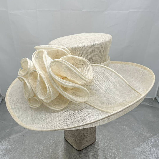 Madhatter style hat embellished with sinamay swirls: Lime