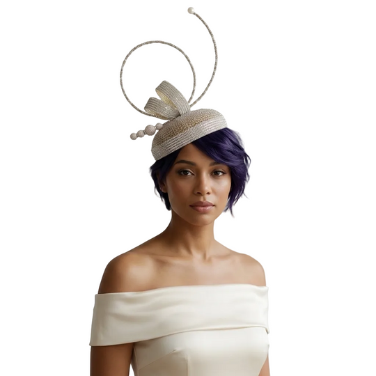 Woman wearing a decorative headpiece with a plain background
