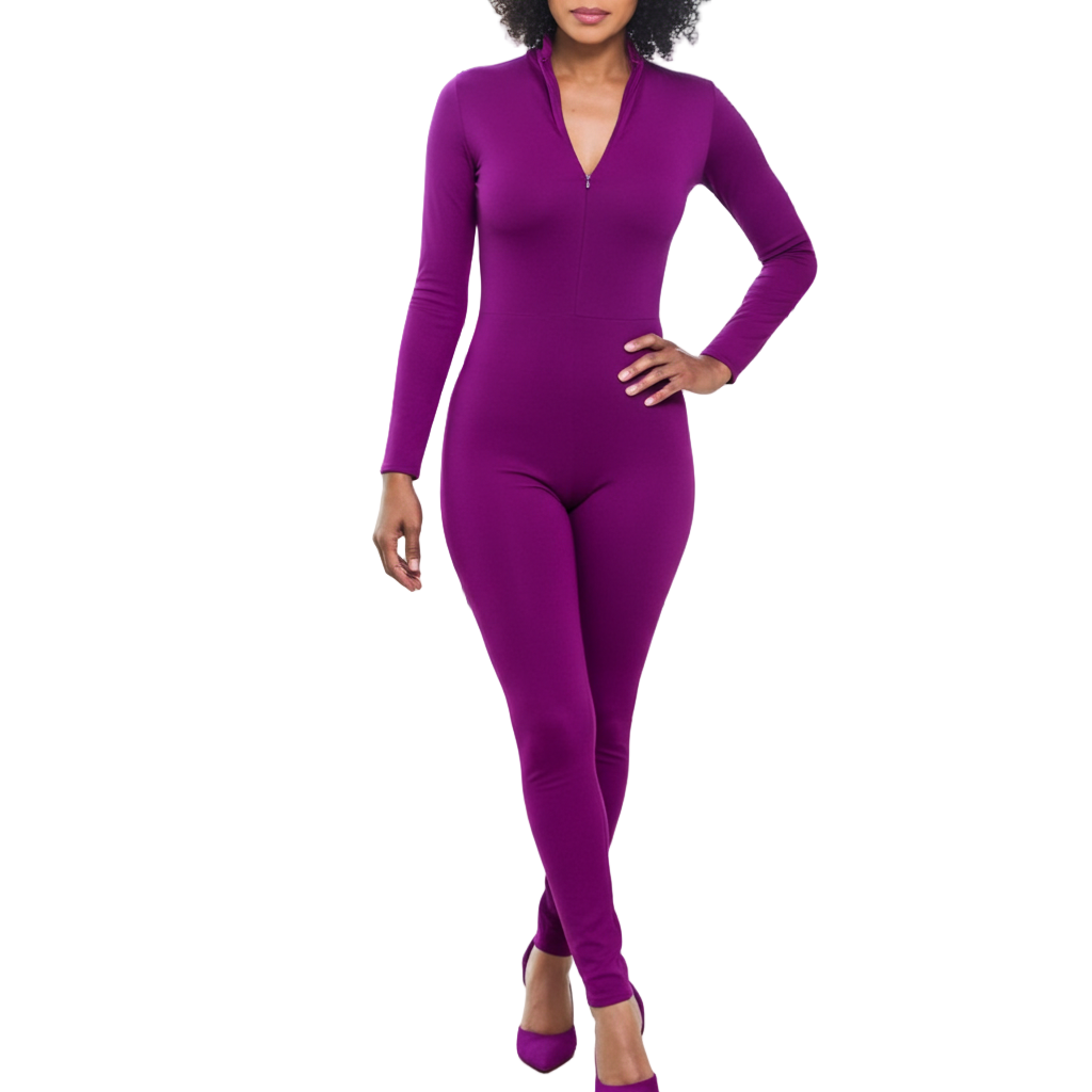 Person wearing a purple bodysuit standing in front of large windows with a cityscape view.