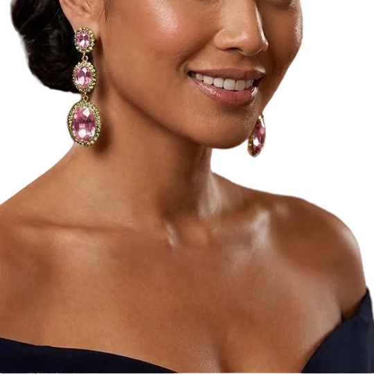 Woman wearing elegant earrings in a formal setting