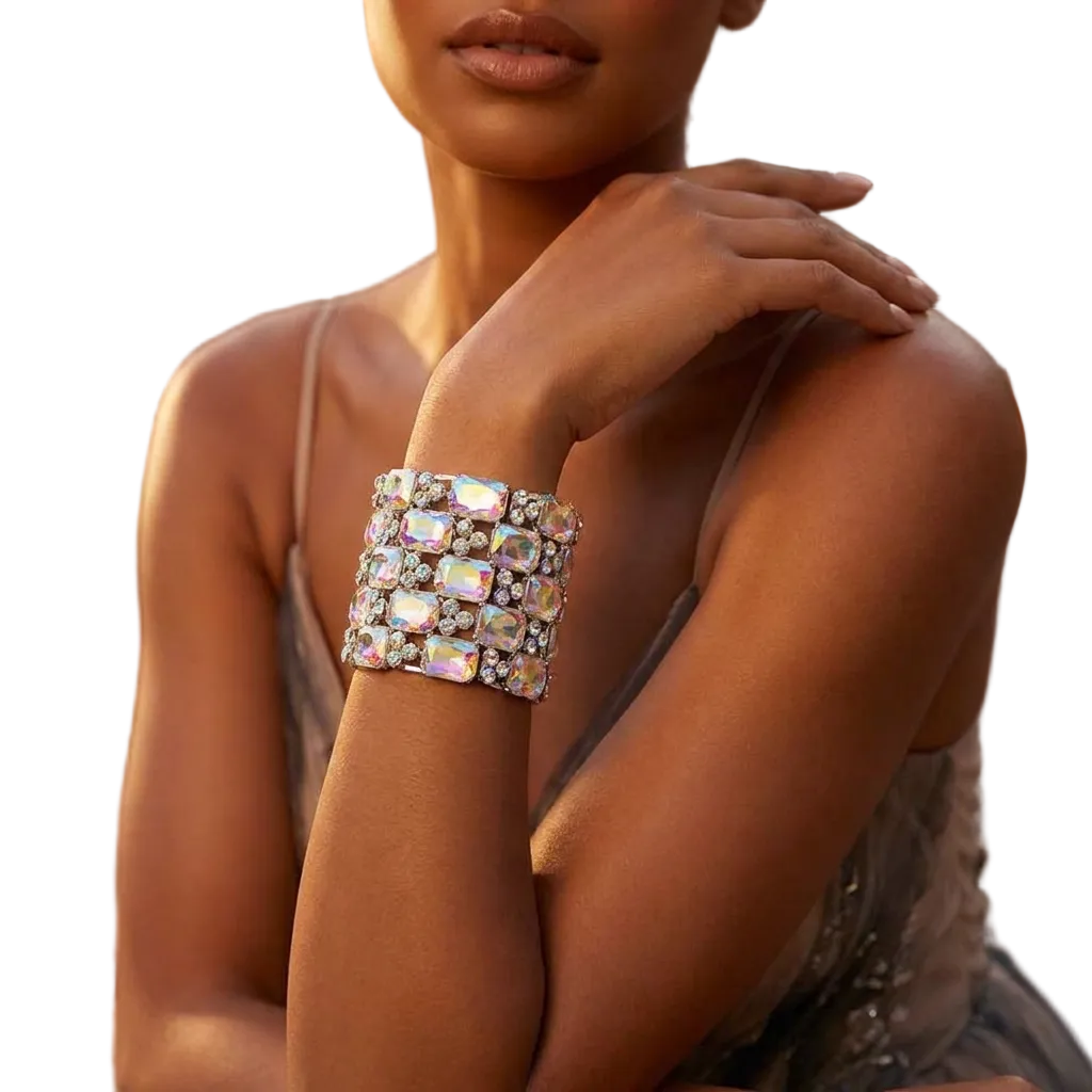 Woman wearing a sparkling bracelet with a blurred outdoor background