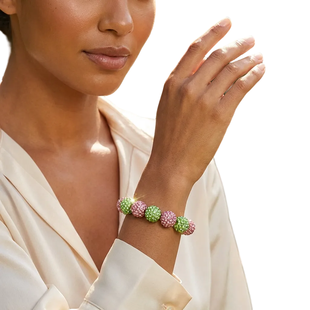 Woman wearing a colorful beaded bracelet with a blurred floral background