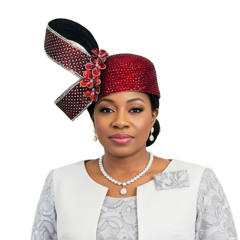 Woman wearing a decorative red and black headpiece with a white outfit on a white background