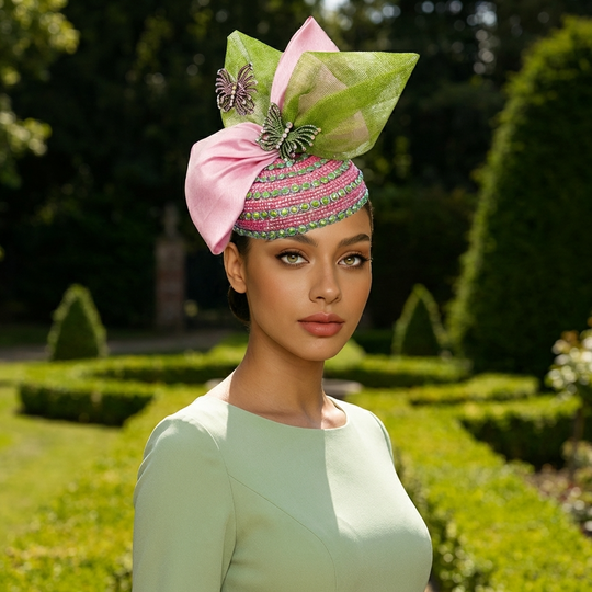 Woman wearing a decorative headpiece in a garden setting