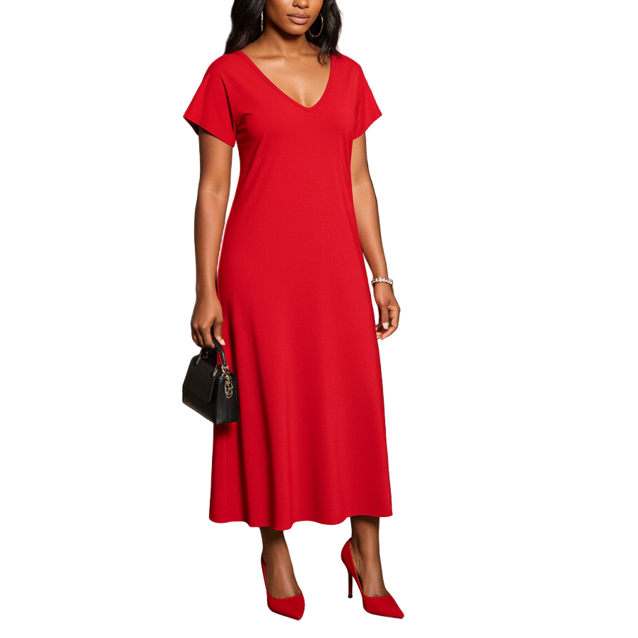 Woman in a red dress standing outside a building with a plant and glass door in the background.