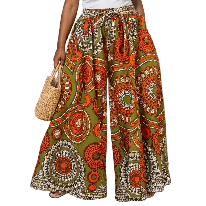 Woman in a colorful skirt standing on a street with shops and palm trees in the background