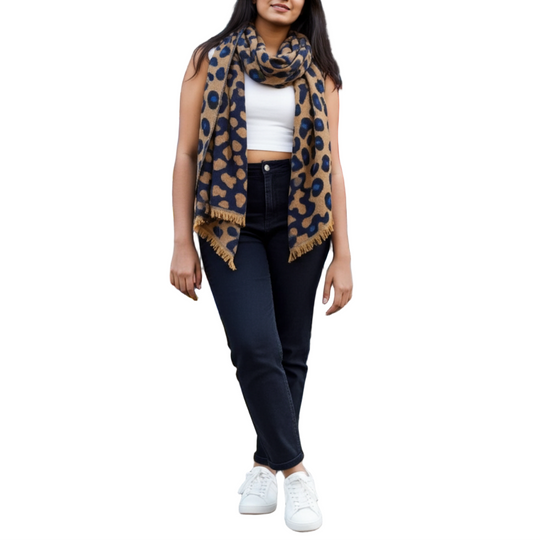 Woman standing in front of a colorful graffiti wall