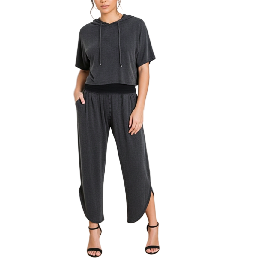 Model wearing charcoal gray tulip palazzo pants and crop hoodie lounge set with wide-leg tulip hem and pleated waistband.