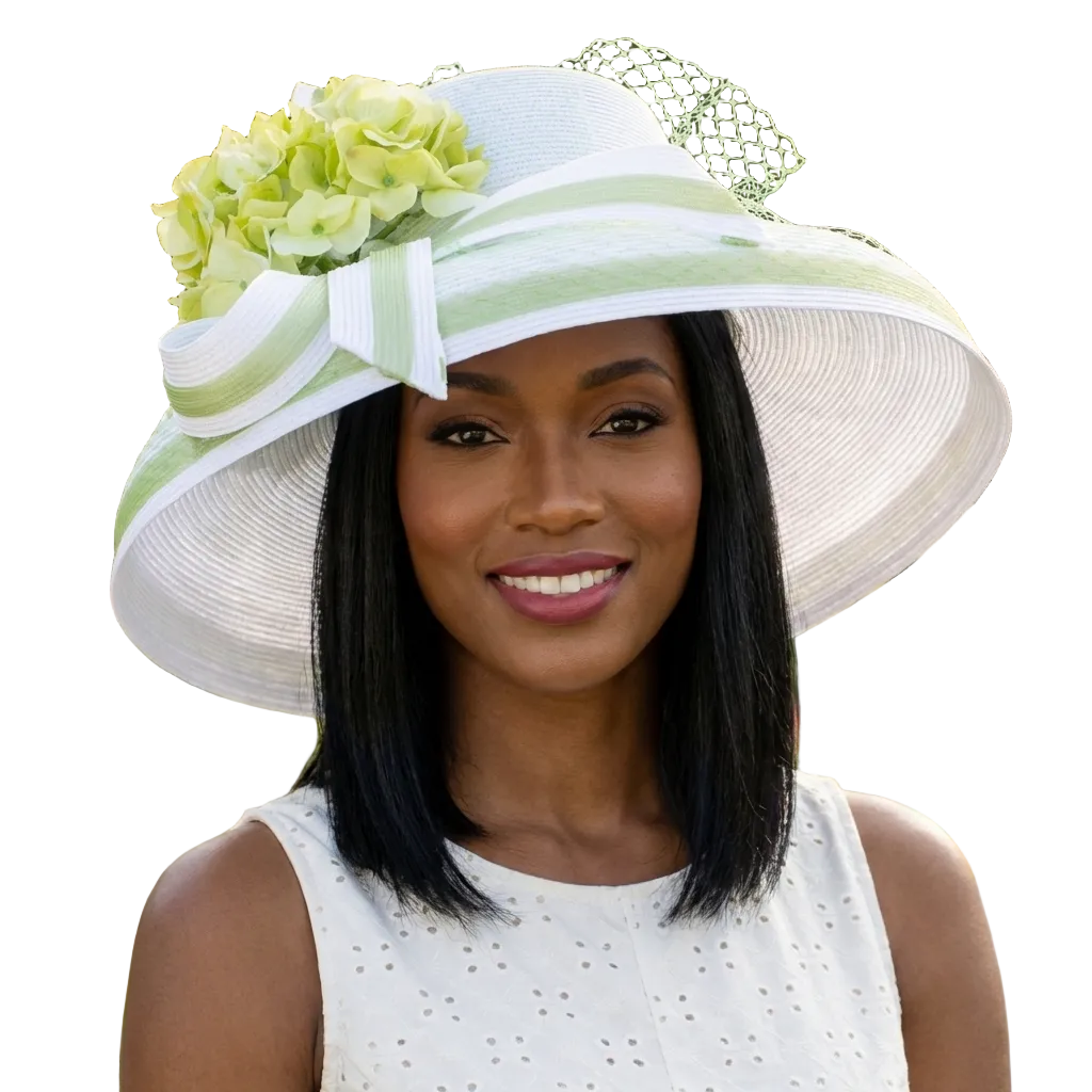 Woman wearing a white and green hat with floral decorations outdoors.
