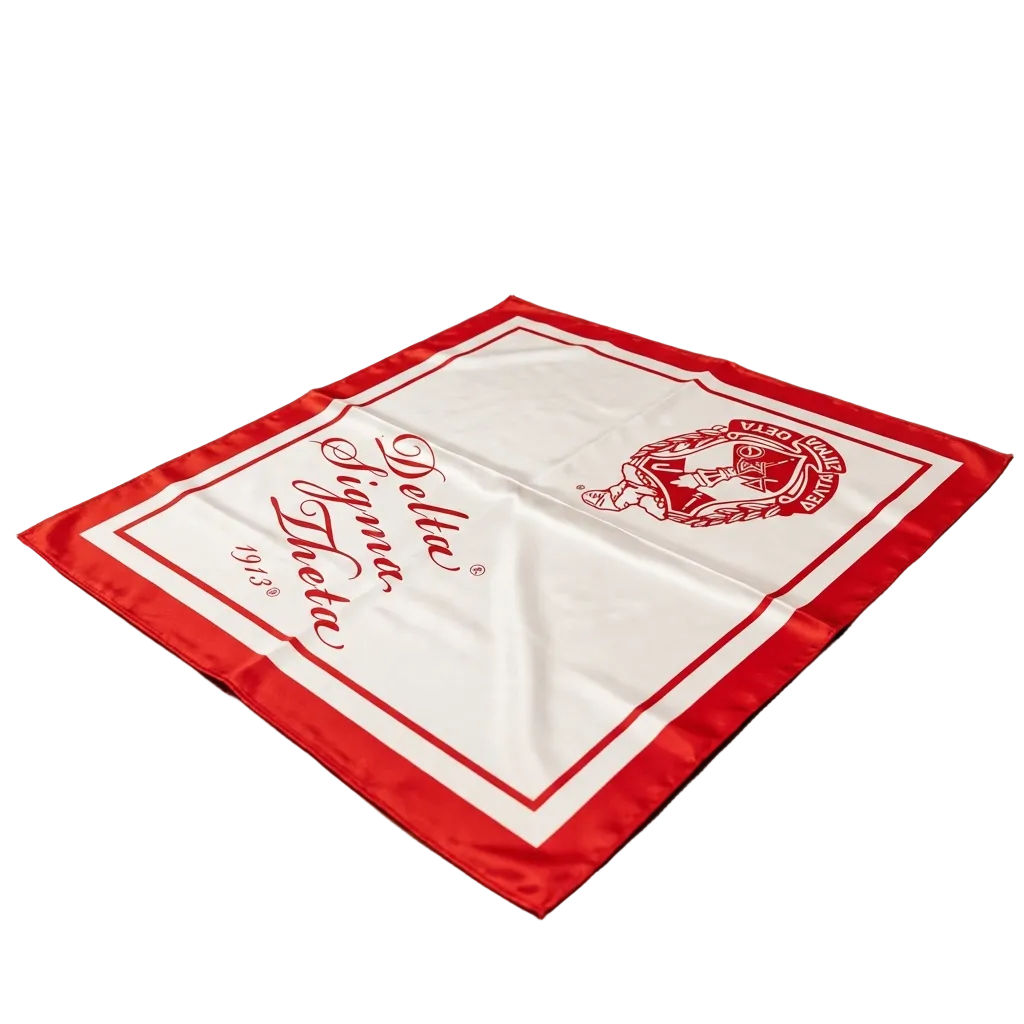 Red and white Delta Sigma Theta Sorority  scarf on a wooden table with a store interior background.