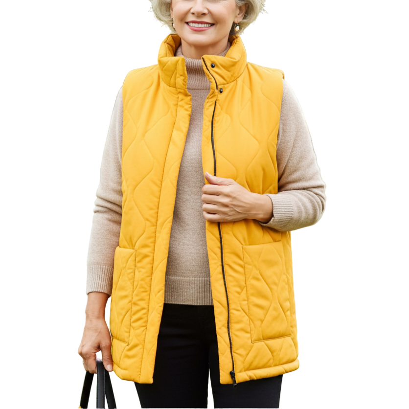 Woman wearing a yellow vest in an autumn park