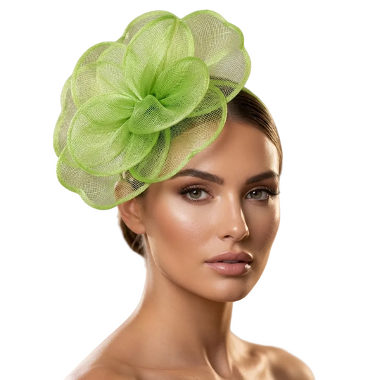Woman wearing a green floral headpiece against a blurred background