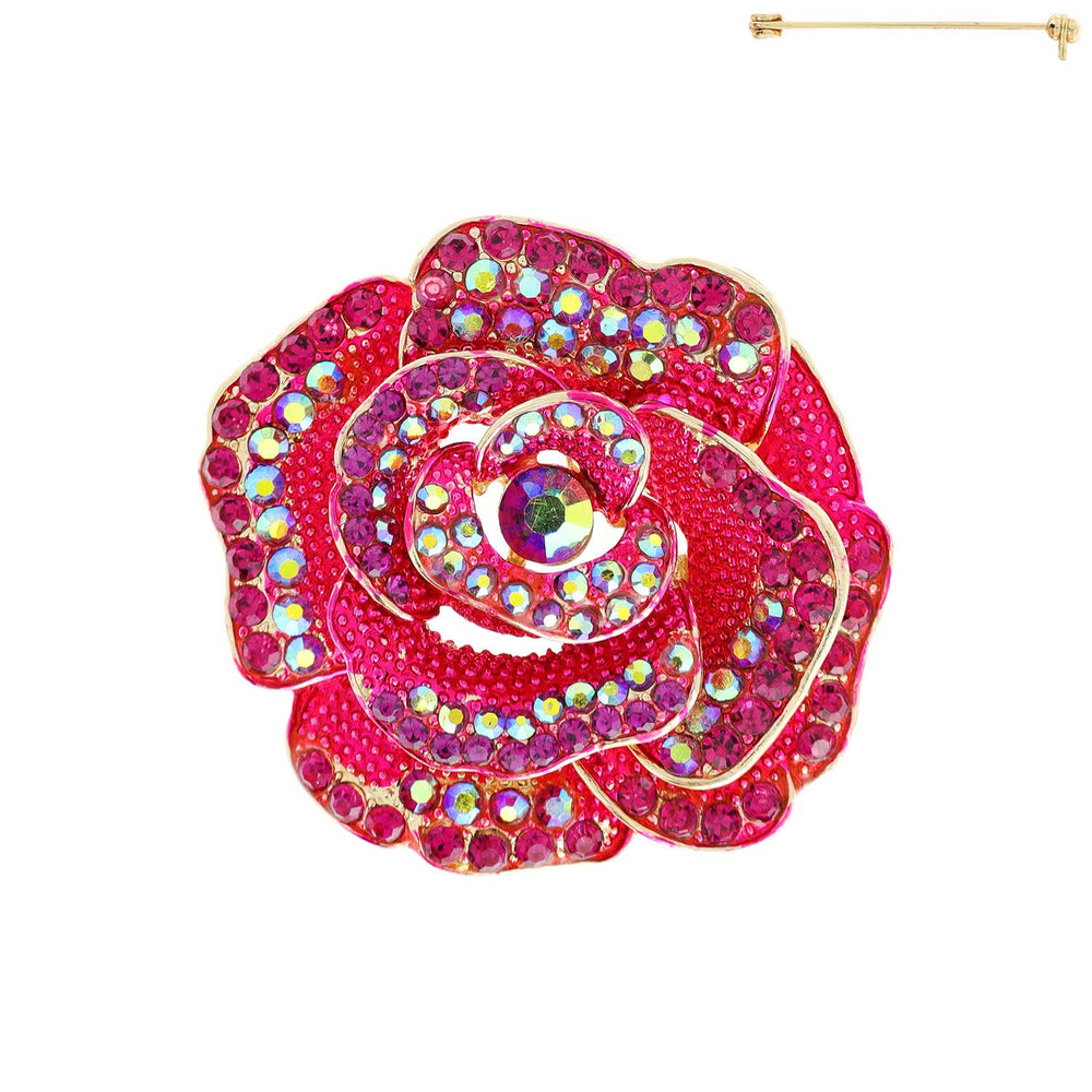 Pink rose-shaped brooch with gemstones on a white background