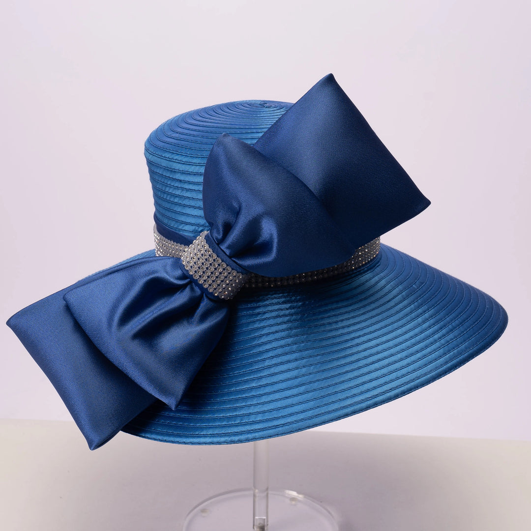 Blue hat with a large bow on a white background