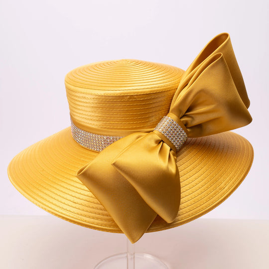 Yellow hat with a large bow on a white background