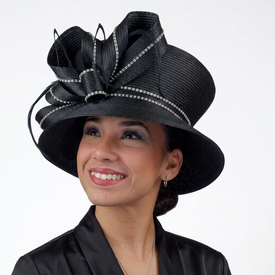 Woman wearing a black decorative hat with a white background