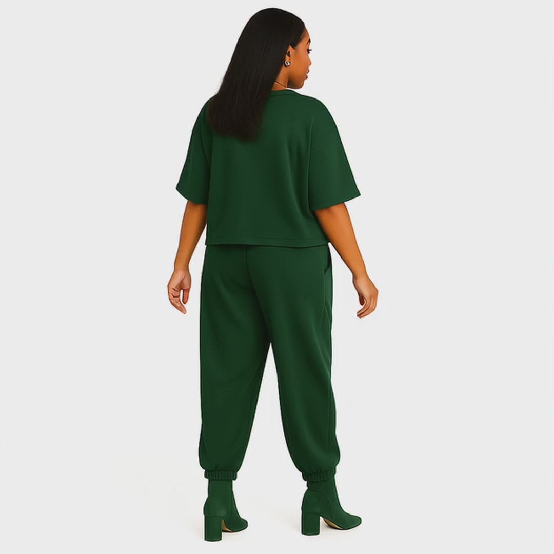 side view emerald green two piece outfit on model - video
