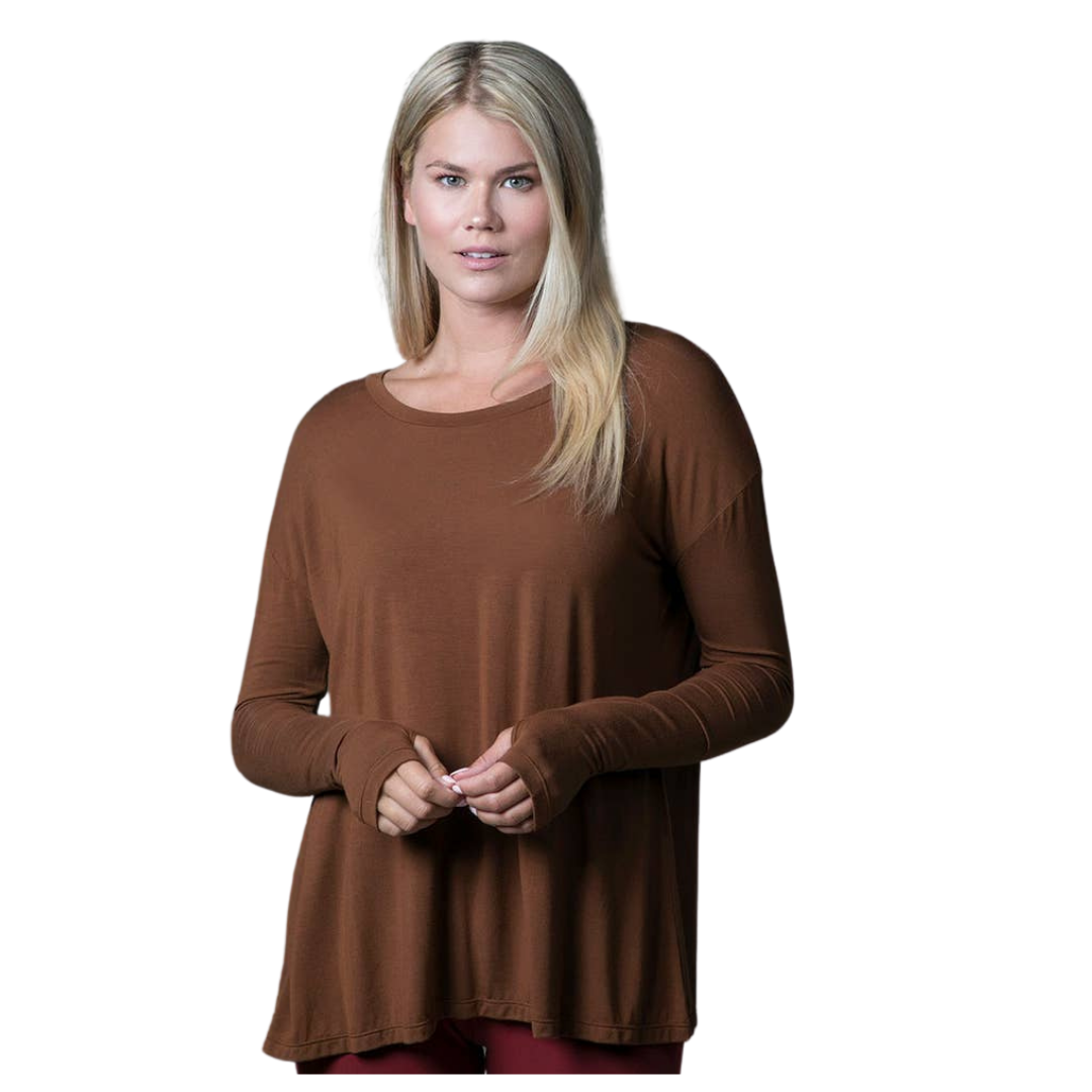 Perfect Long Sleeve Yoga Tee (Bronze)
Why we love this: This deliciously soft Yoga Tee is a fall essential in our Bronze hue, featuring a scoop neckline & thumbhole detailing on each sleeve. Featuring: KiraGrace Luxe: Feels ultra-soft and luxurious Loose & flowy Versatile, from street to studio Thumbhole detailing Made in U.S.A. of imported fabric Fabric & Care KiraGrace Luxe: Tencel® Modal/Spandex *Tencel® Modal Stretch Jersey is an ultra-luxurious, super-soft fabric derived from renewable wood sources gro