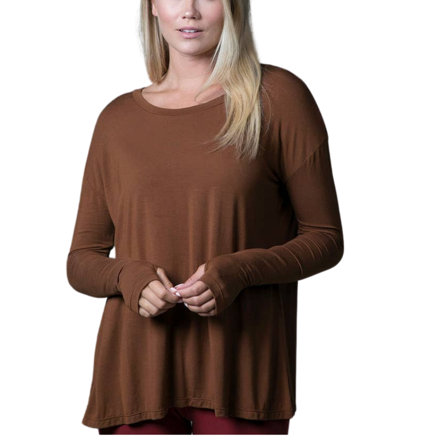 Perfect Long Sleeve Yoga Tee (Bronze)
Why we love this: This deliciously soft Yoga Tee is a fall essential in our Bronze hue, featuring a scoop neckline & thumbhole detailing on each sleeve. Featuring: KiraGrace Luxe: Feels ultra-soft and luxurious Loose & flowy Versatile, from street to studio Thumbhole detailing Made in U.S.A. of imported fabric Fabric & Care KiraGrace Luxe: Tencel® Modal/Spandex *Tencel® Modal Stretch Jersey is an ultra-luxurious, super-soft fabric derived from renewable wood sources gro