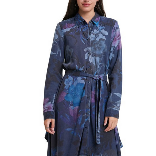 Blue Floral Shirt Collar Dress
Blue Floral Shirt Collar Dress Shirt dresses are in style in summer, and now in winter, too. This one, in military style with embroidered friezes in front and printed all over the dress, has buckles on the shoulders that emphasize its hunting style. Midi-length, it's made in Tencel and has a very lovely drape. Shirt collar Front buttoning Print of floral friezes Embroidery of friezes in front yoke Belt of the same fabric and print Buckles of the same fabric on the shoulders Mi