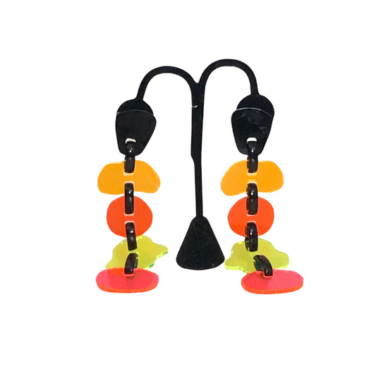 Totem Neon - Earrings
Bold and beautiful, the Michaela Malin Totem Earrings are whimsical and striking. Perfect for any occasion. Material: AcrylicOrigin: Made in Israel Lightweight Neon discs Clip closure 5" long Encapsulating the spirit of innovation, Michaela Malin derives inspiration for her designs and aesthetics from architectural forms and way of thought.
Totem Neon - Earrings
Bold and beautiful, the Michaela Malin Totem Earrings are whimsical and striking. Perfect for any occasion. Material: Acrylic