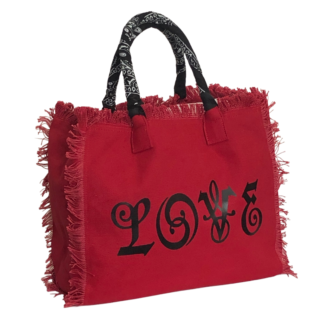 LOVE Shoulder Tote - Bandana - Red/Black
We have improved this best-selling bag! Now larger and roomier it's a shoulder tote and fully lined too! Fringe Bag Perfect everyday bag! - "LOVE" Fully lined canvas tote with soft-support bottom and bandana covered handles. Inside bag has 1 convenient inside zippered pockets and 2 insert pockets. Bag handles are at 7.5" drop and fits comfortably around the shoulder. Dimensions: 12"X14"X6.5" Made in USA
LOVE Shoulder Tote - Bandana - Red/Black
"LOVE" Fully lined canv