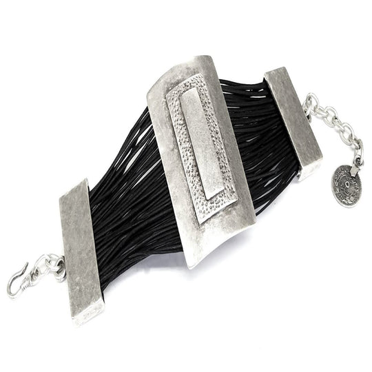 Leather & Pewter Rectangular Disc Bracelet
Leather Bracelet: Leather & Pewter Rectangular Disc Bracelet Antique silver plated pewter handmade bracelet with genuine black leather strands. Bracelet has a stacked hammered rectangular center disc with chain and hook closure making the bracelet adjustable for almost any wrist. Features: Leather Bracelet is Nickel Free & Hypoallergenic.
Leather & Pewter Rectangular Disc Bracelet
Leather Bracelet: Leather & Pewter Rectangular Disc Bracelet Antique silver plated pe