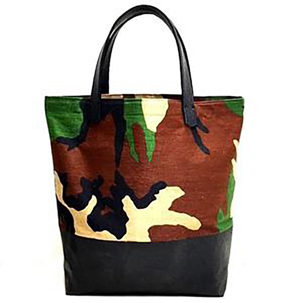 Pop Tote - Lightweight Canvas Tote
Allow 14 days for delivery. Stylish tote that is perfect to carry those little miscellaneous items that completes the day. Bag is made of lightweight cotton canvas fabric with a rubberized bottom and leather straps. Measures 13 3/4 in. tall x 15 in. wide x 4 in. deep. Straps are 20 in. long x 1 in. wide. Handcrafted. Made in NYC.
Pop Tote - Lightweight Canvas Tote
Lightweight Cotton Canvas Tote Bag with a rubberized bottom and leather straps. Handcrafted. Made in NYC.


$7