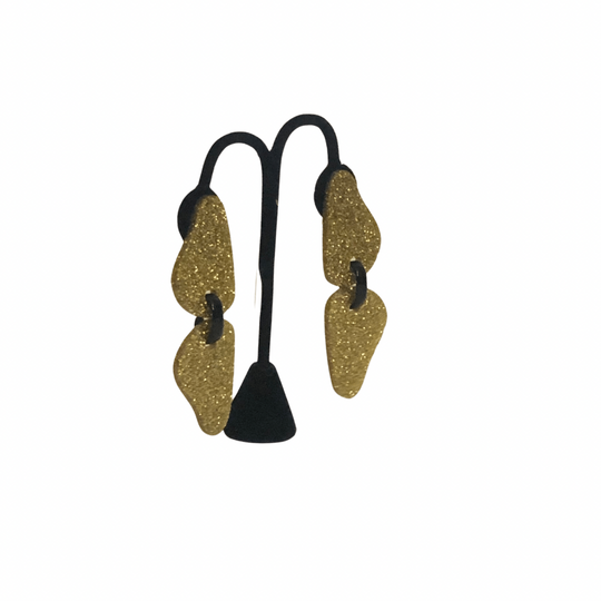 Twins All Gold Earrings
Bold and beautiful, the Michaela Malin Twin Leaves Earrings are simple yet stunning. Material: Acrylic and sterling silverOrigin: Made in Israel Lightweight Textured leaves print Clip on and piercing 3.5" long
Twins All Gold Earrings
Our Viso Black earrings by Michaela Malin are a show stopper for sure. They are light and airy and so much fun to wear. Bold and beautiful 
twingold

$95
$95
$95
acrylic earrings, earrings, gold and black earrings, gold and black sparkle earrings, gold c